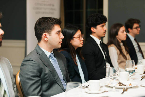 Christian Yerelekian participates in a Tocqueville Fellow event.