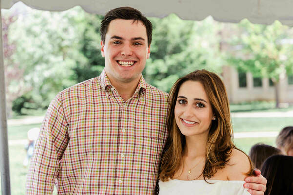 Luca Fanucchi is a Caucasian man with brown hair standing with a Caucasian woman with brown hair.