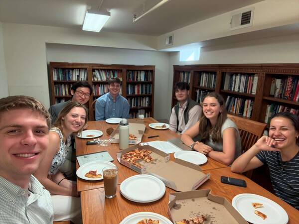 Lilian Jochmann shares a meal with her Witherspoon Institute student colleagues.
