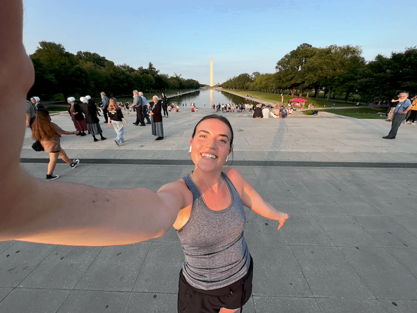 Molly Griffith stops for a picture in front of the Washington Monument.