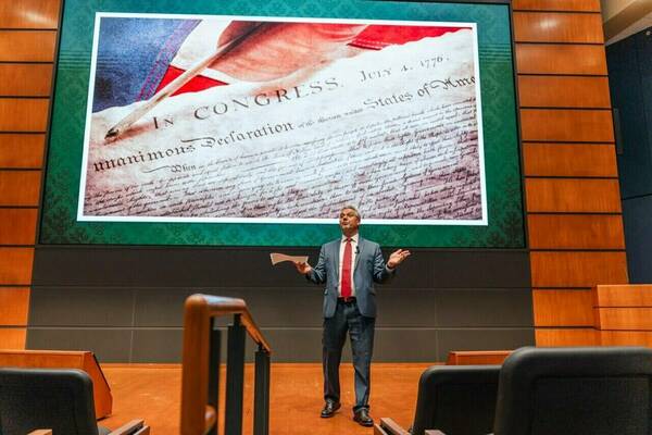 Professor Munoz giving his first lecture at the 1776 class.
