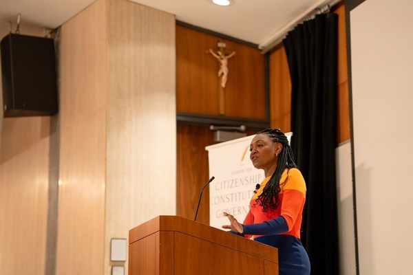 Christine Emba giving a lecture for the CCCG at Carey Auditorium.