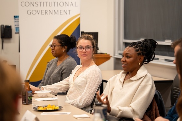 Picture of Ava Warner during a colloquium with Christine Emba.
