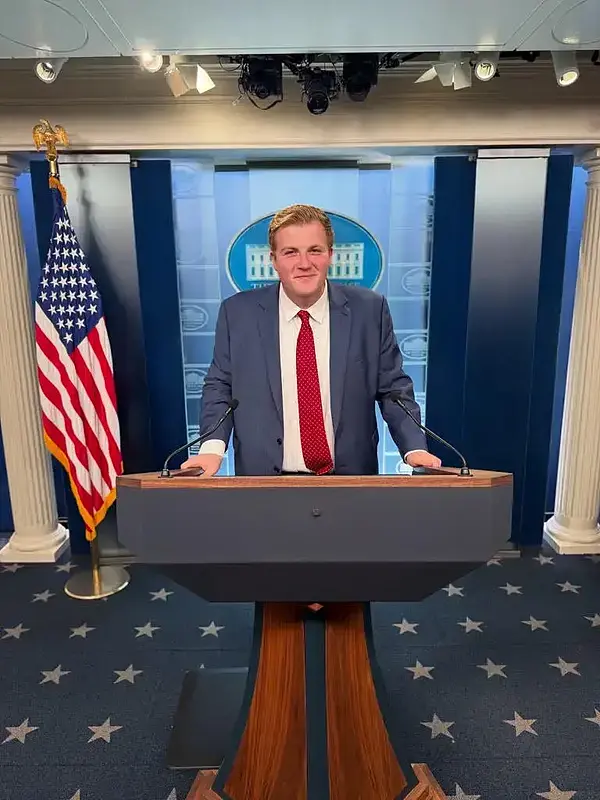 John Vranas poses during his internship at the White House
